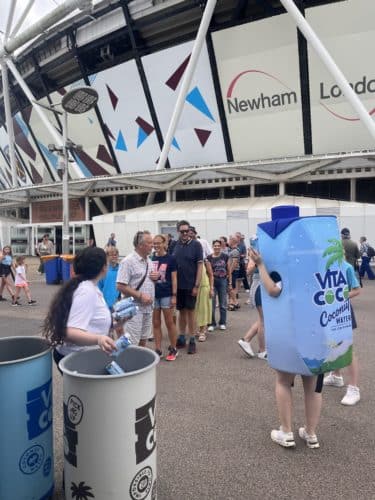 mascot standing outside sports venue