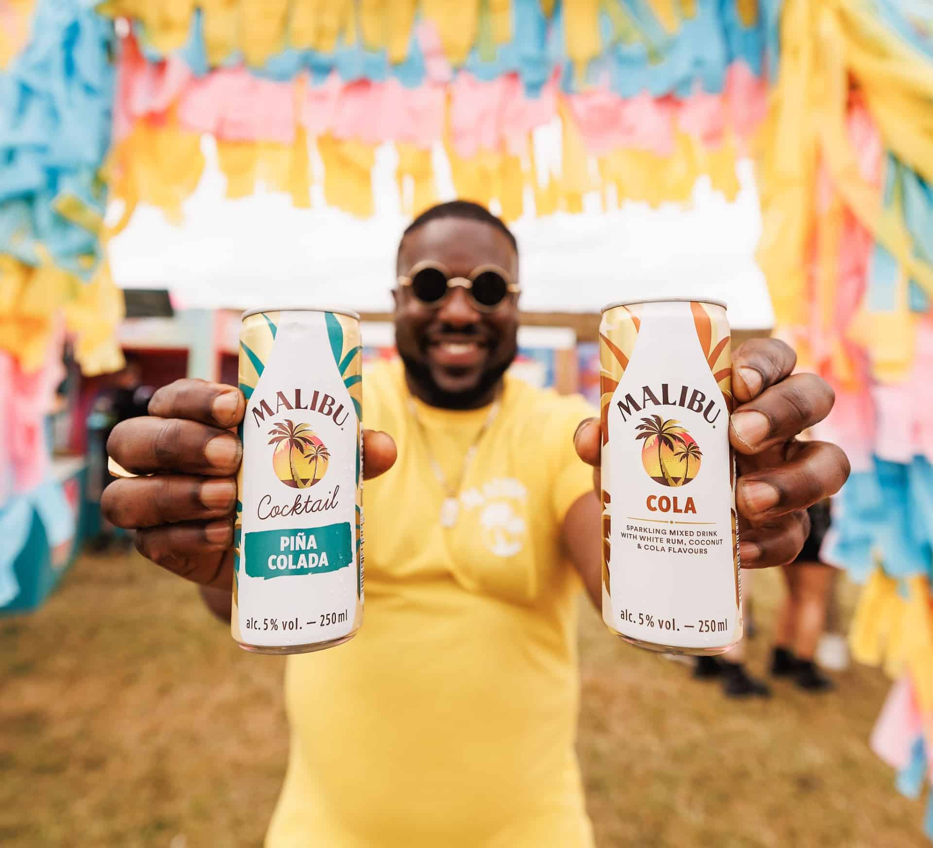 Malibu holding drinks