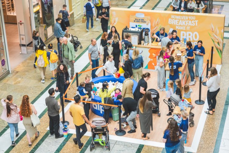 crowd of people at an activation in a mall