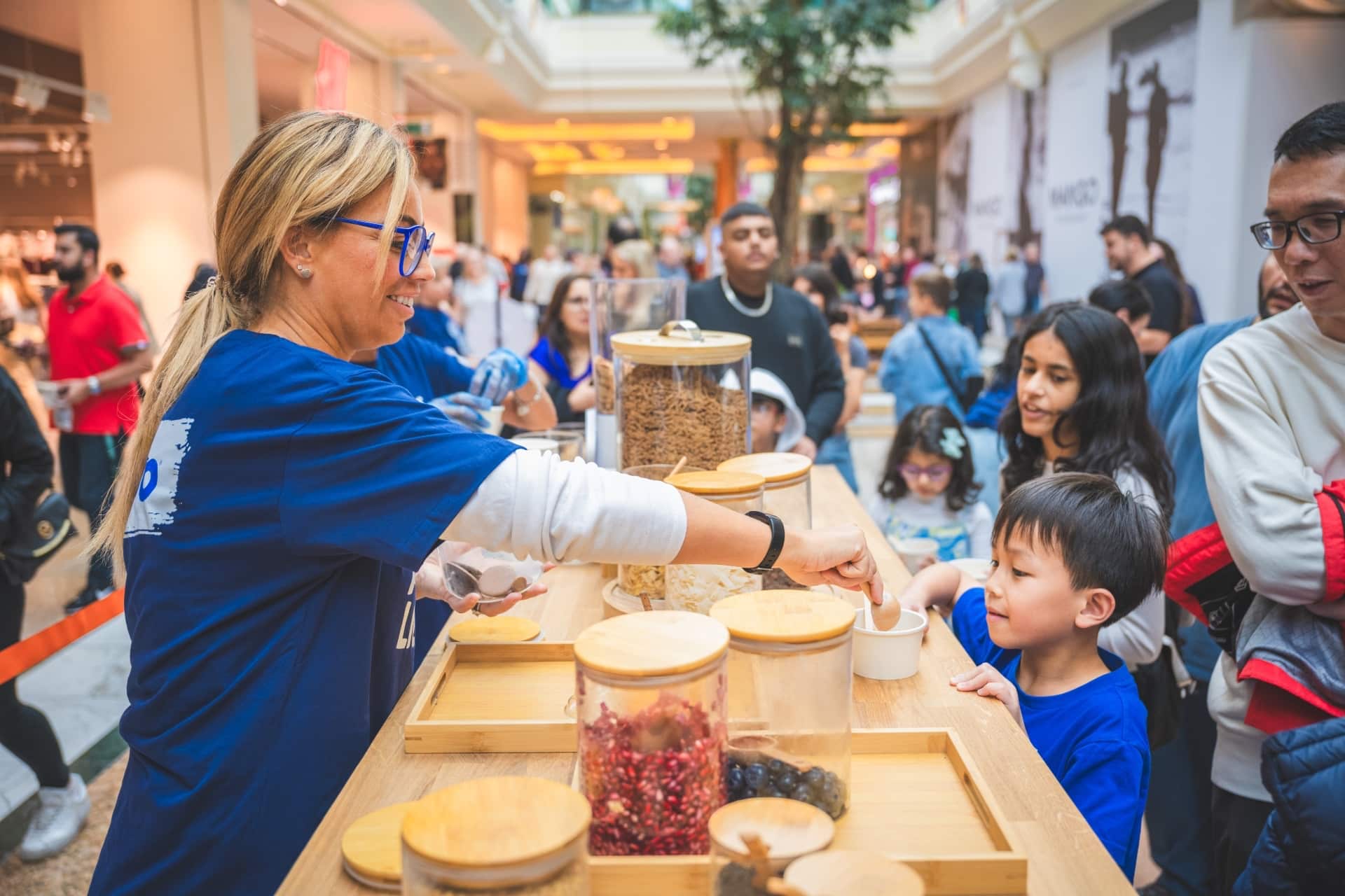 woman sharing food with visitors